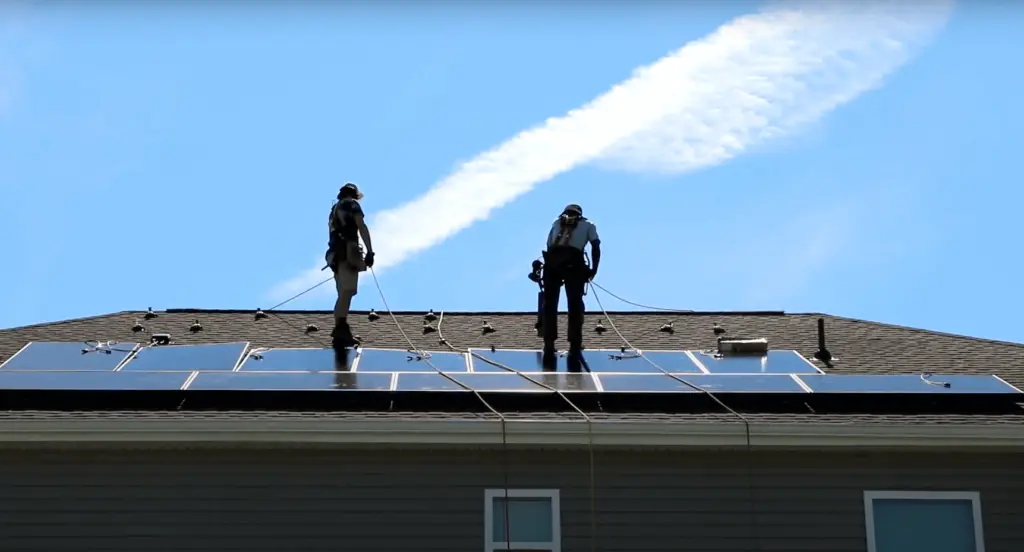 Southern Energy Management solar team installing panels on a roof